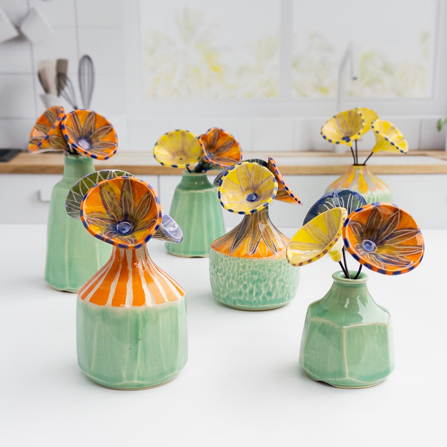 55 - FLOWER BOUQUET: Faceted Vase with Orange Blooms