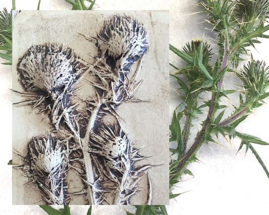 Making embossing plates from clay slabs as part of art residency.