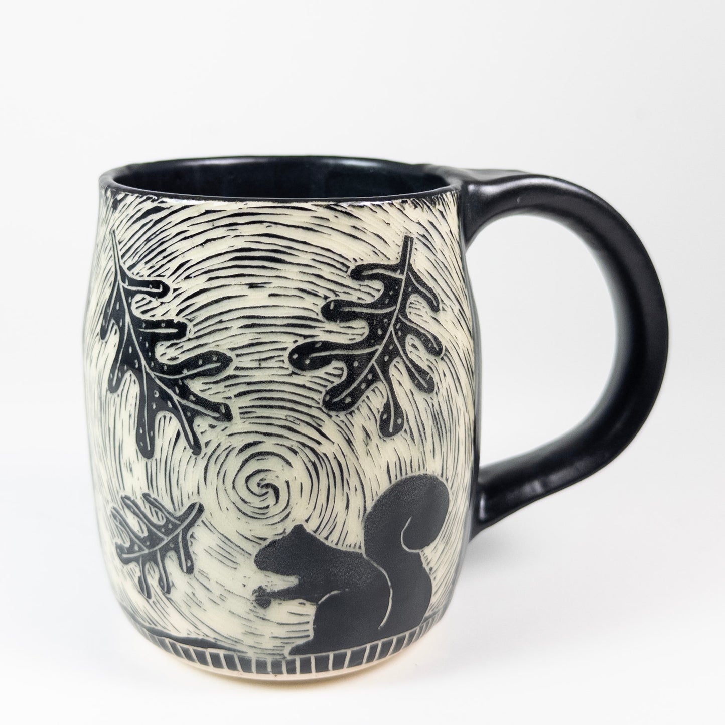 Mug #58 - Squirrel and Swirling Leaves - Black Matte Glaze
