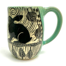 Load image into Gallery viewer, Mug #14 - Woodcut Rabbits and Celadon Glaze
