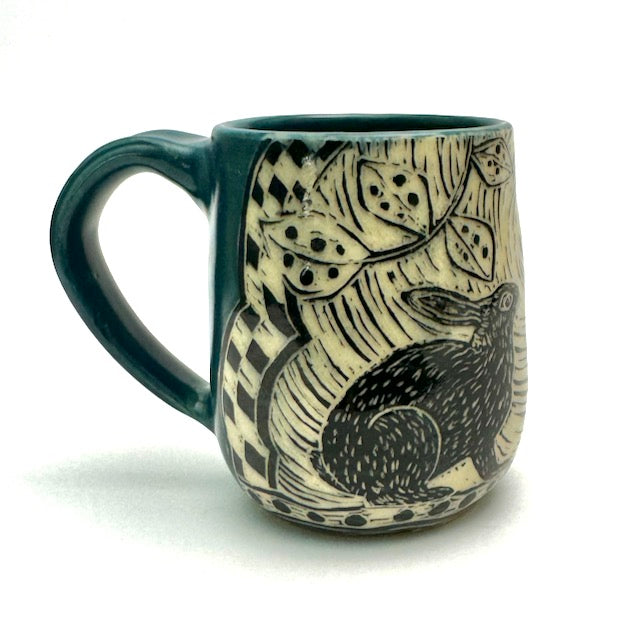 Mug #23 - Woodcut Rabbits with Teal Blue Glaze – Patricia Griffin Studio