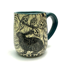 Load image into Gallery viewer, Mug #23 - Woodcut Rabbits with Teal Blue Glaze
