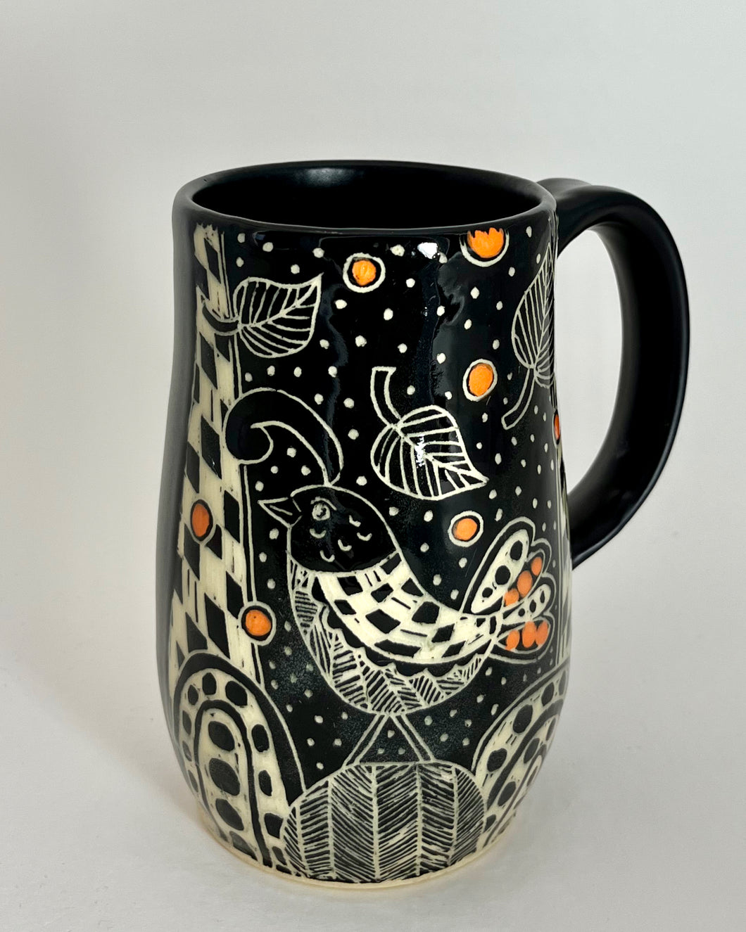 #32- Strutting Bird Mug with Orange Dots and Black Matte Glaze